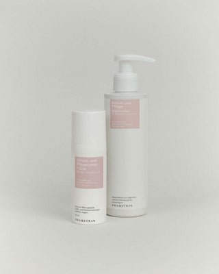 Phametra Schutz- und Pflegecreme mit Zink und Schutz und Pflege Waschlotion für den Intimbereich, beide in weißen Flaschen mit rosa Etiketten, entwickelt von Wissenschaftlern und Dermatologen für empfindliche Haut und tägliche Intimpflege