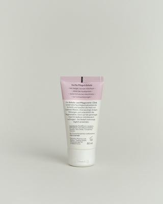 Produktbild der Schutz und Pflegecreme + Zink in der Tube von hinten.